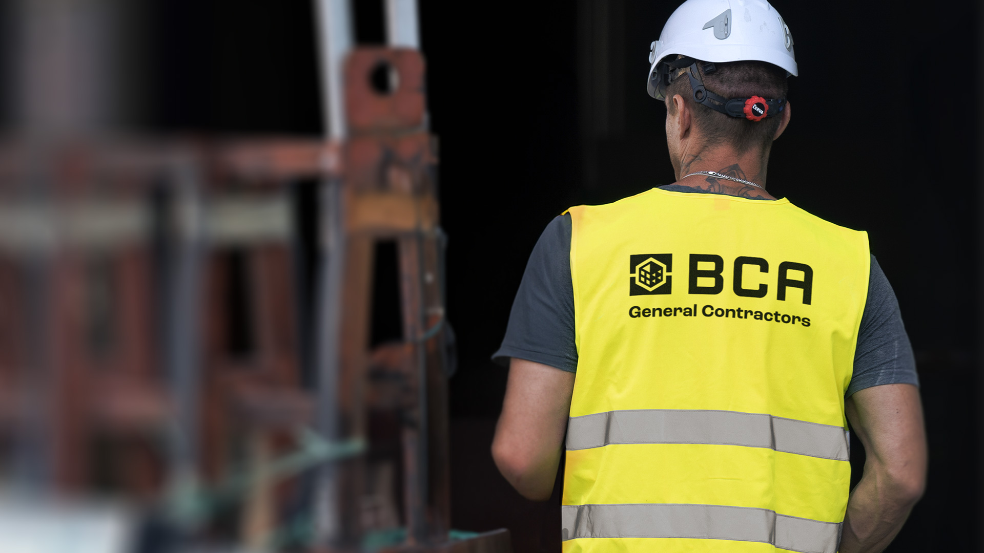 Build your career at BCA. Photo of worker wearing a hardhat and safety vest with BCA logo.